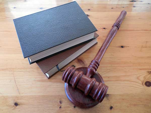 Law Books and Gavel Distracted driver personal injury law